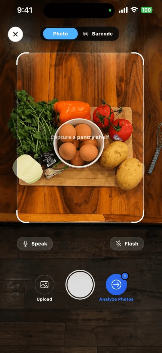 CookSnap camera pointed at a cutting board of fresh ingredients on a wooden table